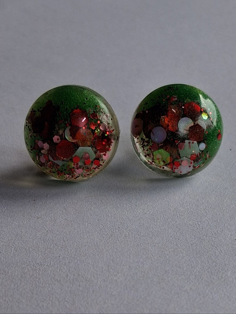 Hand Crafted Green Resin Stud Earrings with Red and Pink Glitter